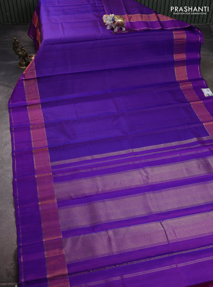 Pure kanchipuram silk saree blue and violet with allover stripe pattern and rettapet zari woven border