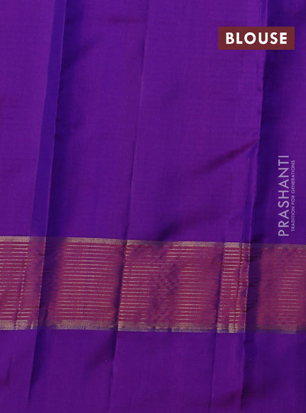 Pure kanchipuram silk saree blue and violet with allover stripe pattern and rettapet zari woven border