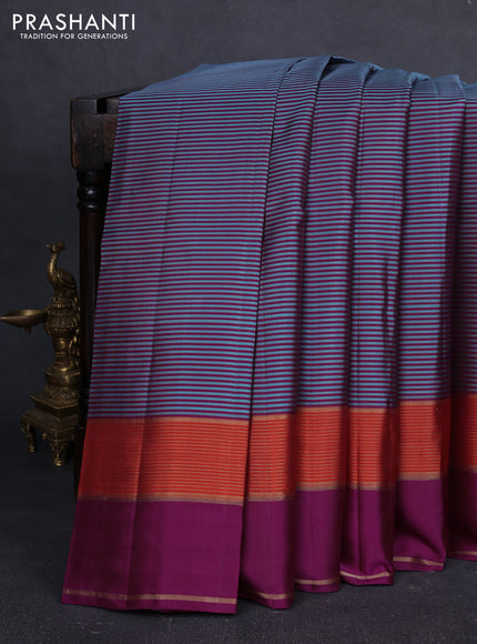 Pure kanchipuram silk saree teal blue and wine shade with allover stripe pattern and rettapet zari woven border