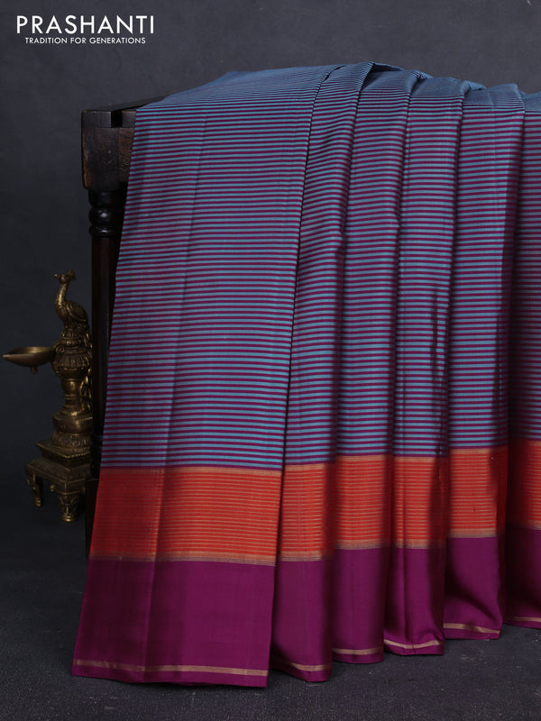 Pure kanchipuram silk saree teal blue and wine shade with allover stripe pattern and rettapet zari woven border