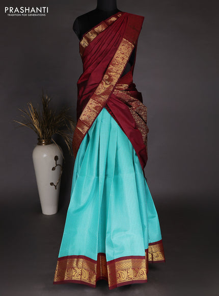 Pure kanchipuram silk lehenga dhawani teal blue and maroon with allover checked pattern and rich zari woven border