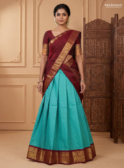 Pure kanchipuram silk lehenga dhawani teal blue and maroon with allover checked pattern and rich zari woven border