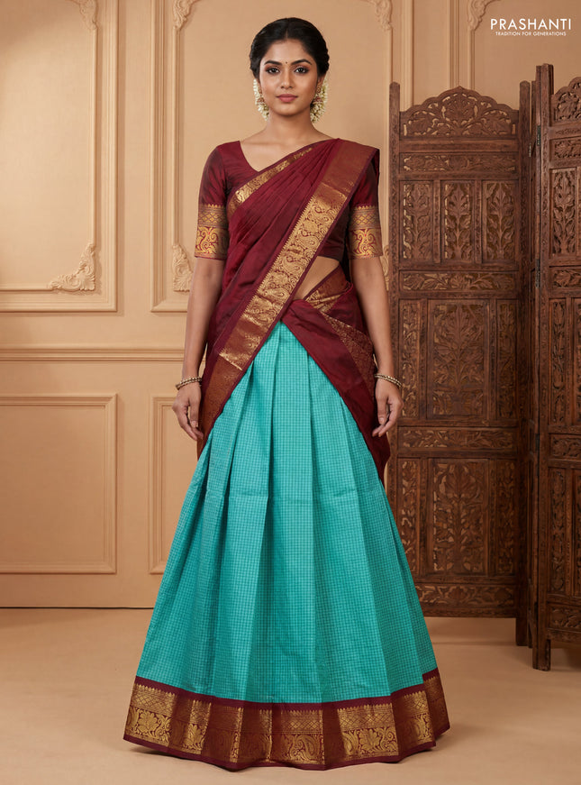 Pure kanchipuram silk lehenga dhawani teal blue and maroon with allover checked pattern and rich zari woven border