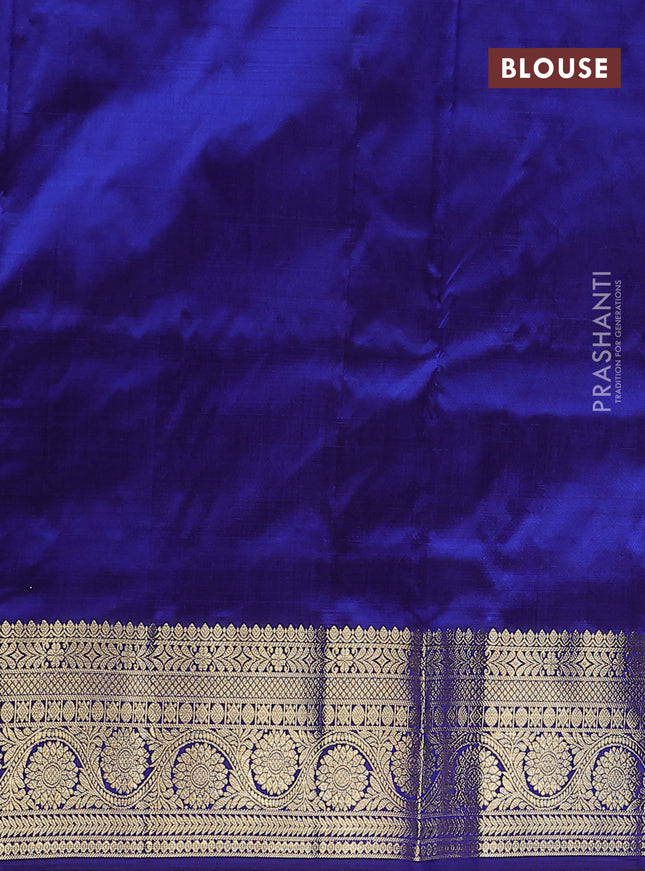Pure kanchipuram silk lehenga dhawani dual shade of bluid=sh green and blue with allover zari checks & buttas and rich zari woven border