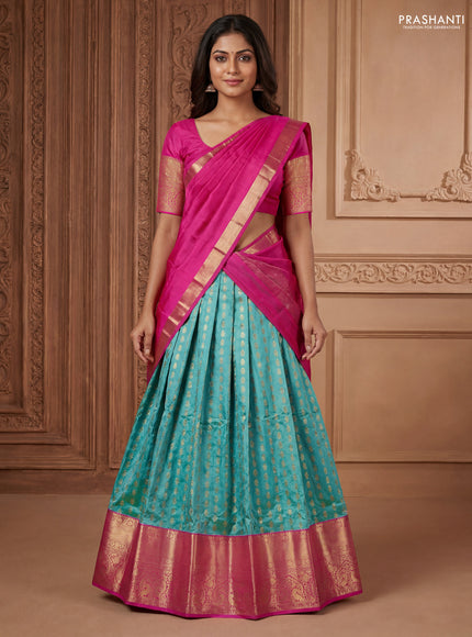 Pure kanchipuram silk lehenga dhawani teal blue and pink with allover zari woven butta weaves and long rich zari woven border