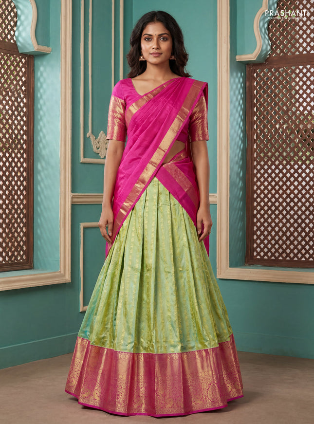 Pure kanchipuram silk lehenga dhawani dual shade of light greenis blue and pink with allover zari woven butta weaves and long rich zari woven border