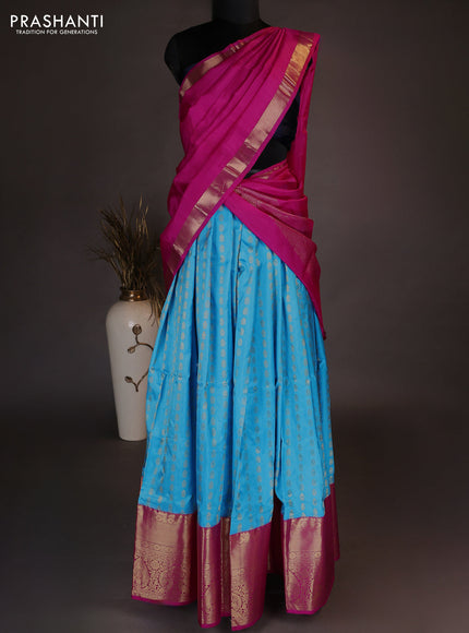 Pure kanchipuram silk lehenga dhawani light blue and pink with allover zari woven butta weaves and long rich zari woven border