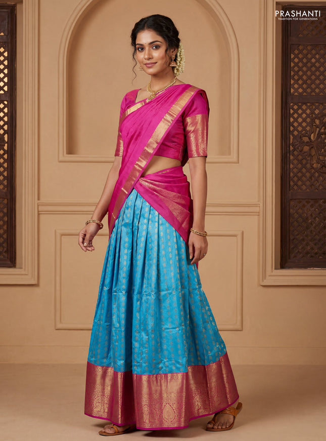 Pure kanchipuram silk lehenga dhawani light blue and pink with allover zari woven butta weaves and long rich zari woven border