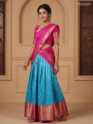 Pure kanchipuram silk lehenga dhawani light blue and pink with allover zari woven butta weaves and long rich zari woven border