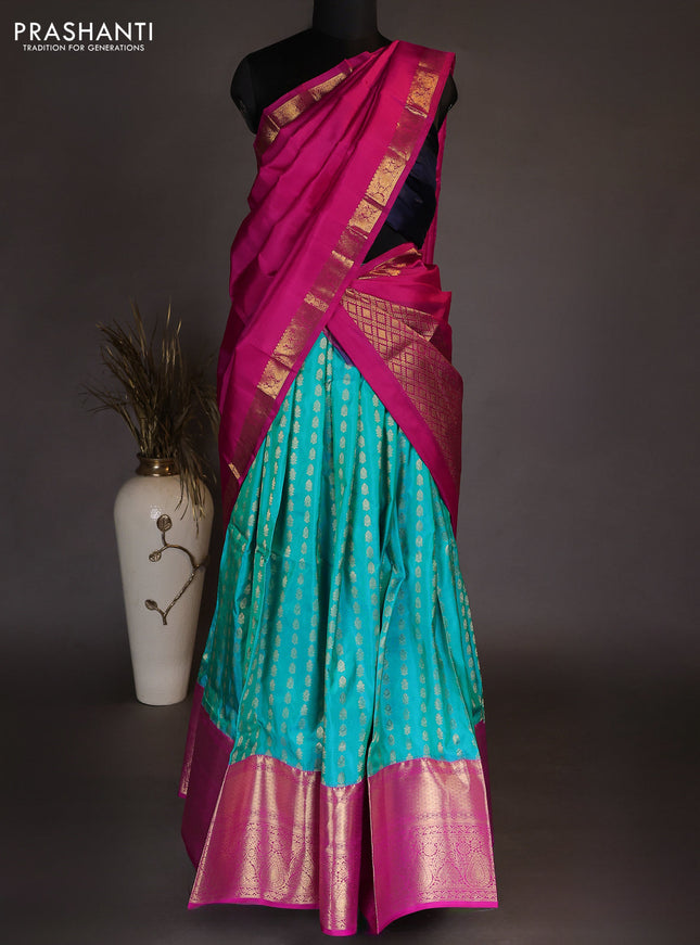 Pure kanchipuram silk lehenga dhawani teal blue and pink with allover zari woven butta weaves and long rich zari woven border