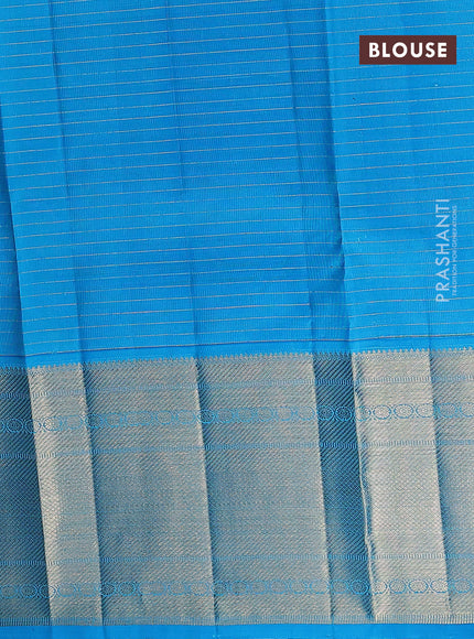 Pure kanchipuram silk lehenga dhawani pink and cs blue with allover small zari checks & buttas and long rich zari woven border
