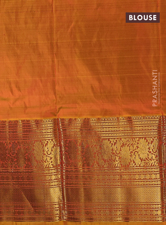 Pure kanchipuram silk lehenga dhawani maroon and dark mustard with allover zari woven paisley butta weaves and long rich zari woven border