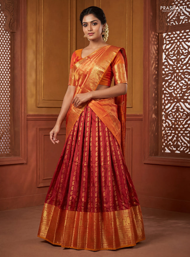 Pure kanchipuram silk lehenga dhawani maroon and dark mustard with allover zari woven paisley butta weaves and long rich zari woven border