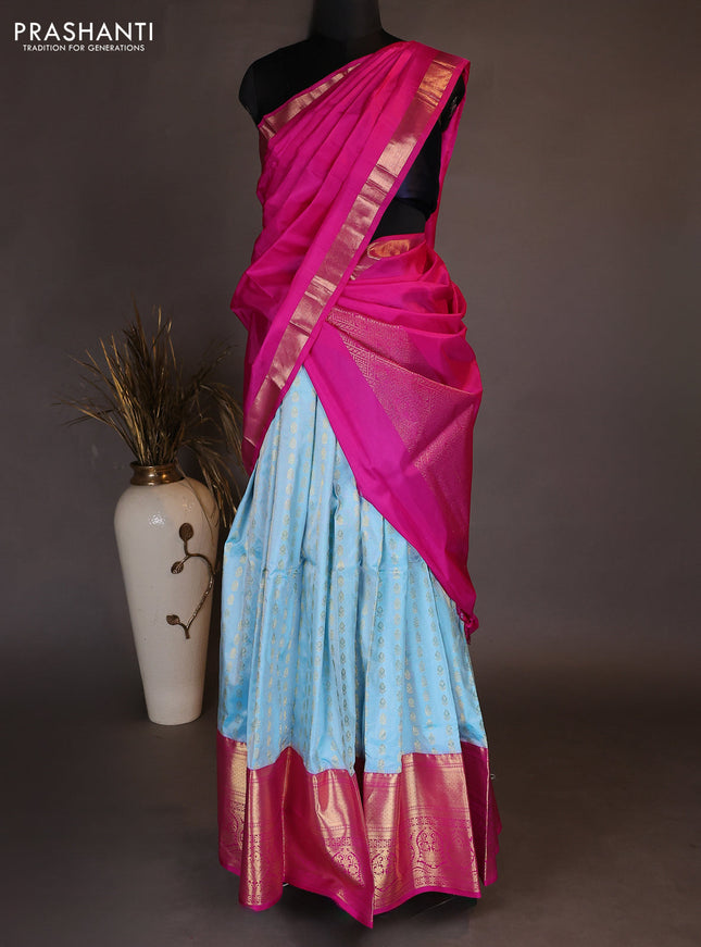 Pure kanchipuram silk lehenga dhawani light blue and pink with allover zari woven butta weaves and long rich zari woven border