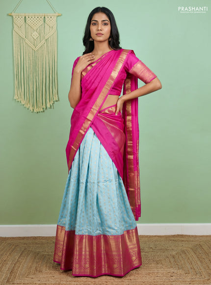 Pure kanchipuram silk lehenga dhawani light blue and pink with allover zari woven butta weaves and long rich zari woven border