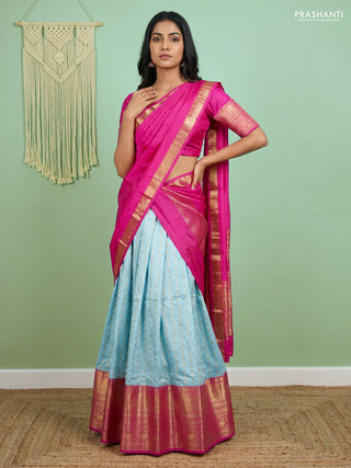 Pure kanchipuram silk lehenga dhawani light blue and pink with allover zari woven butta weaves and long rich zari woven border