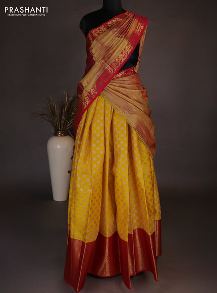 Pure kanchipuram silk lehenga dhawani yellow and red with allover zari woven floral buttas and long zari woven border