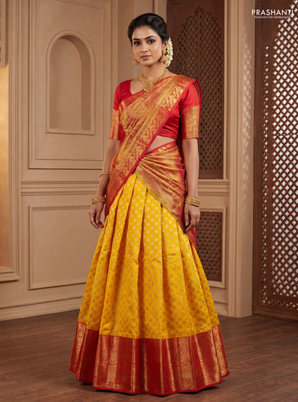 Pure kanchipuram silk lehenga dhawani yellow and red with allover zari woven floral buttas and long zari woven border