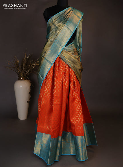 Pure kanchipuram silk lehenga dhawani orange and light blue with allover zari woven floral buttas and long zari woven border