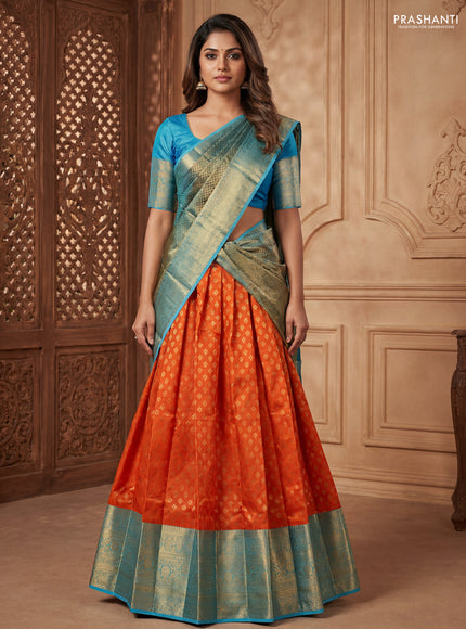 Pure kanchipuram silk lehenga dhawani orange and light blue with allover zari woven floral buttas and long zari woven border