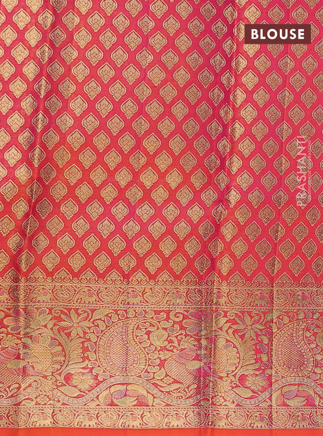 Pure kanchipuram tissue silk lehenga dhawani dark blue and orange with allover zari woven brocade weaves and long rich zari woven border