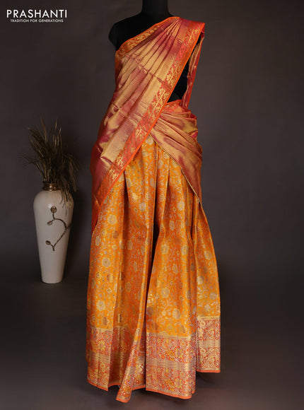Pure kanchipuram silk lehenga dhawani mango yellow and orange with allover zari woven brocade weaves and long rich zari woven border