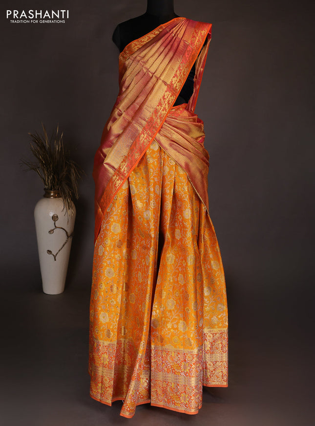 Pure kanchipuram silk lehenga dhawani mango yellow and orange with allover zari woven brocade weaves and long rich zari woven border