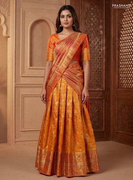 Pure kanchipuram silk lehenga dhawani mango yellow and orange with allover zari woven brocade weaves and long rich zari woven border