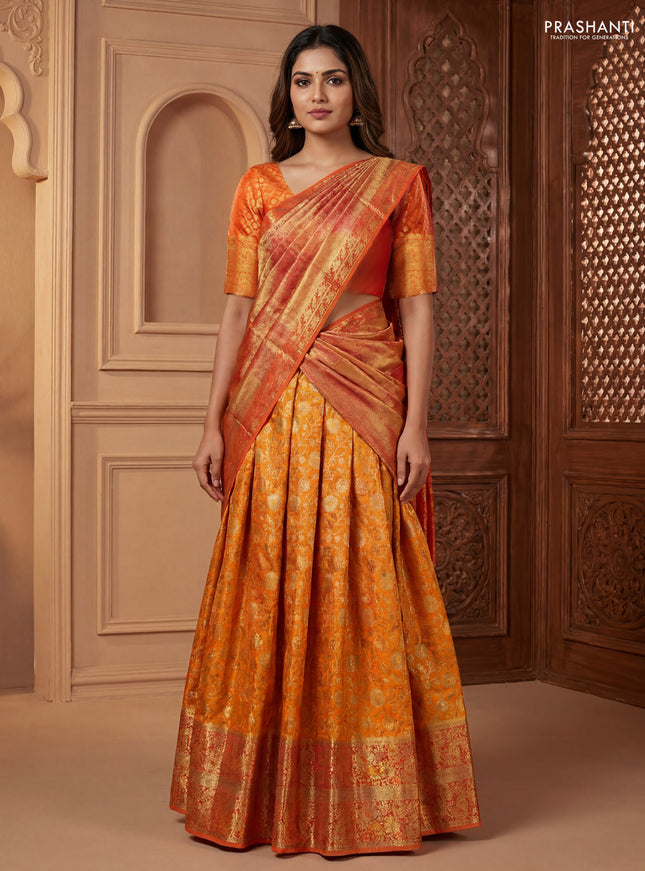 Pure kanchipuram silk lehenga dhawani mango yellow and orange with allover zari woven brocade weaves and long rich zari woven border