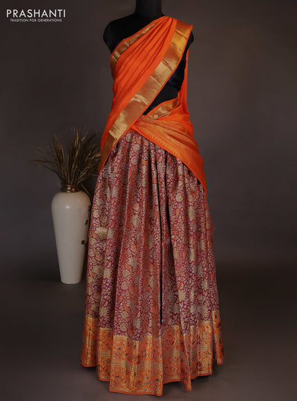 Pure kanchipuram tissue silk lehenga dhawani dual shade of rust and orange with allover zari woven brocade weaves and long rich zari woven border