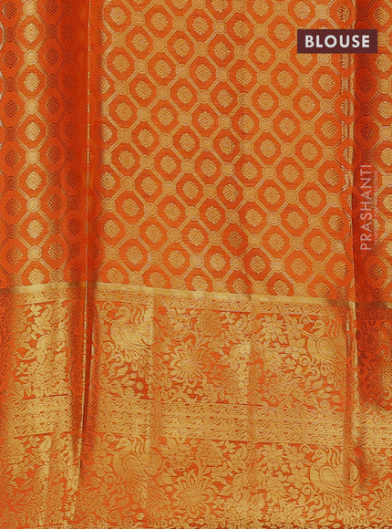 Pure kanchipuram tissue silk lehenga dhawani dual shade of rust and orange with allover zari woven brocade weaves and long rich zari woven border