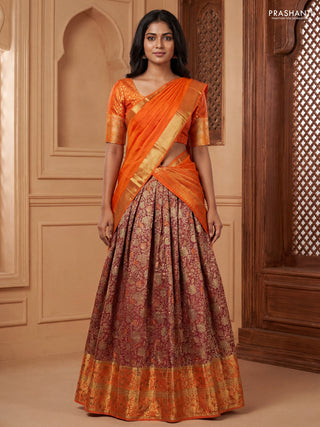Pure kanchipuram tissue silk lehenga dhawani dual shade of rust and orange with allover zari woven brocade weaves and long rich zari woven border