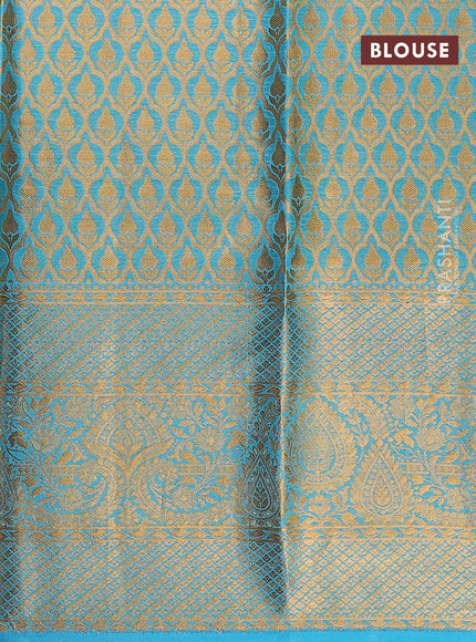 Pure kanchipuram tissue silk lehenga dhawani deep purple and light blue with allover zari woven brocade floral weaves and long rich zari woven border