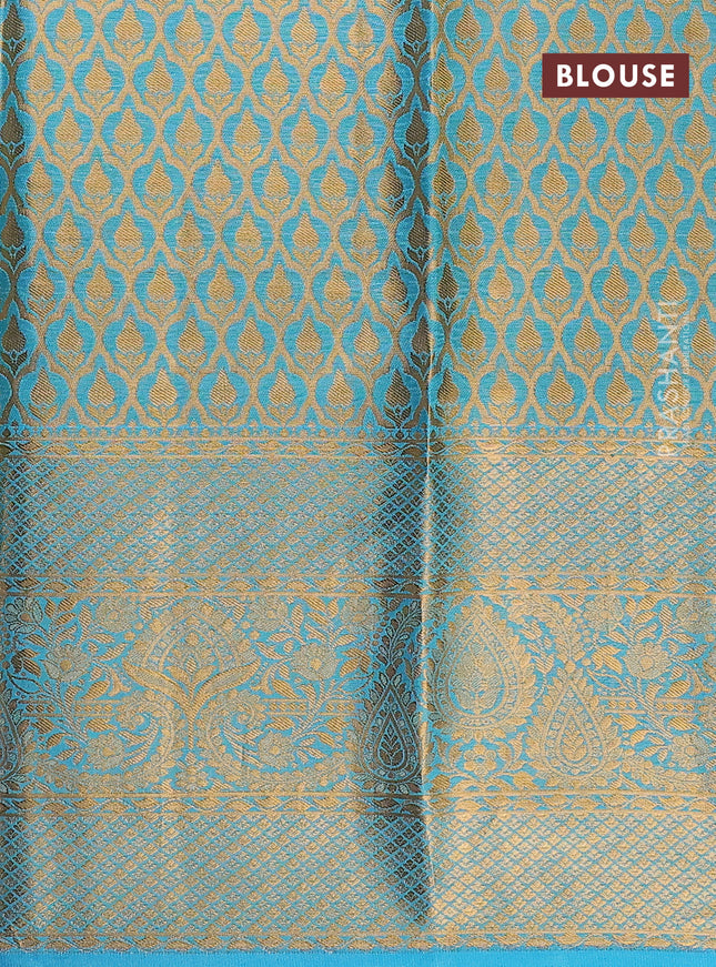 Pure kanchipuram tissue silk lehenga dhawani deep purple and light blue with allover zari woven brocade floral weaves and long rich zari woven border