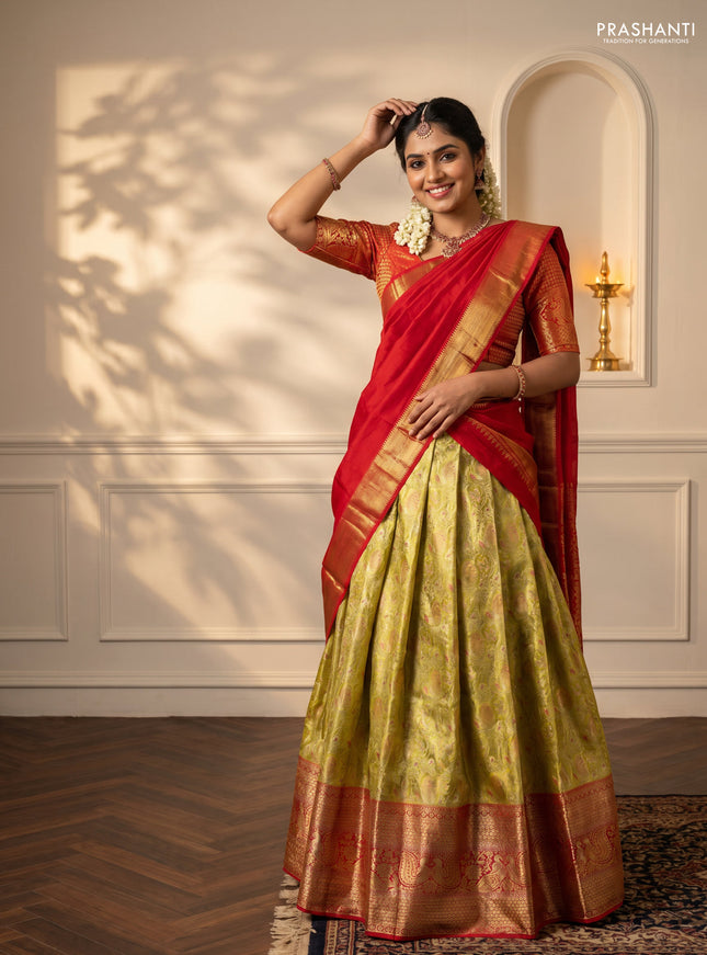 Pure kanchipuram tissue silk lehenga dhawani lime yellow and red with allover zari woven brocade weaves and long rich zari woven border