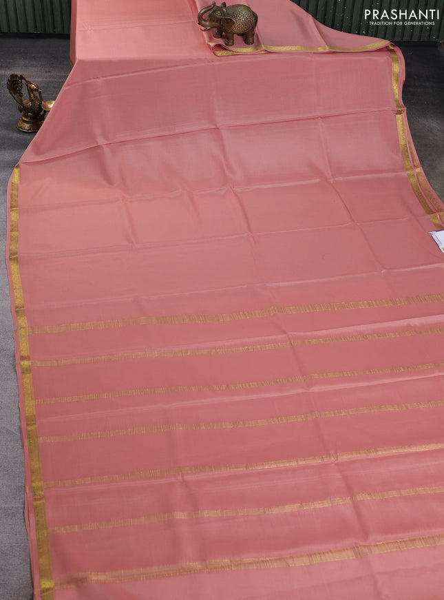 Pure mysore silk saree peach shade with plain body and zari woven border
