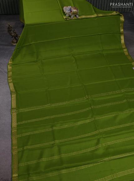 Pure mysore silk saree light green with plain body and zari woven border