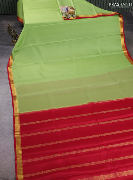 Pure mysore silk saree pista green and red with plain body and paisley zari woven border