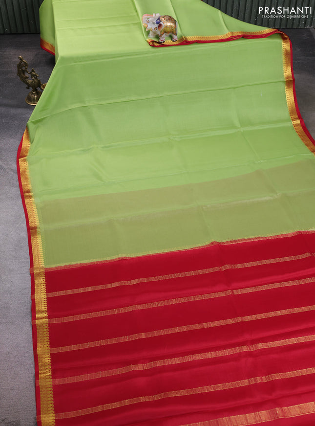 Pure mysore silk saree pista green and red with plain body and paisley zari woven border