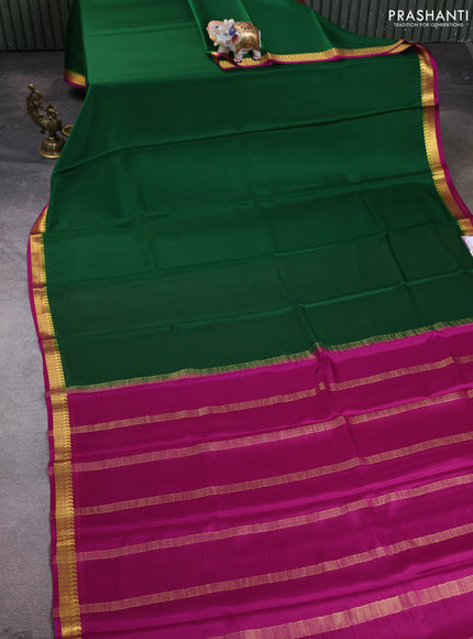 Pure mysore silk saree bottle green and dark pink with plain body and paisley zari woven border