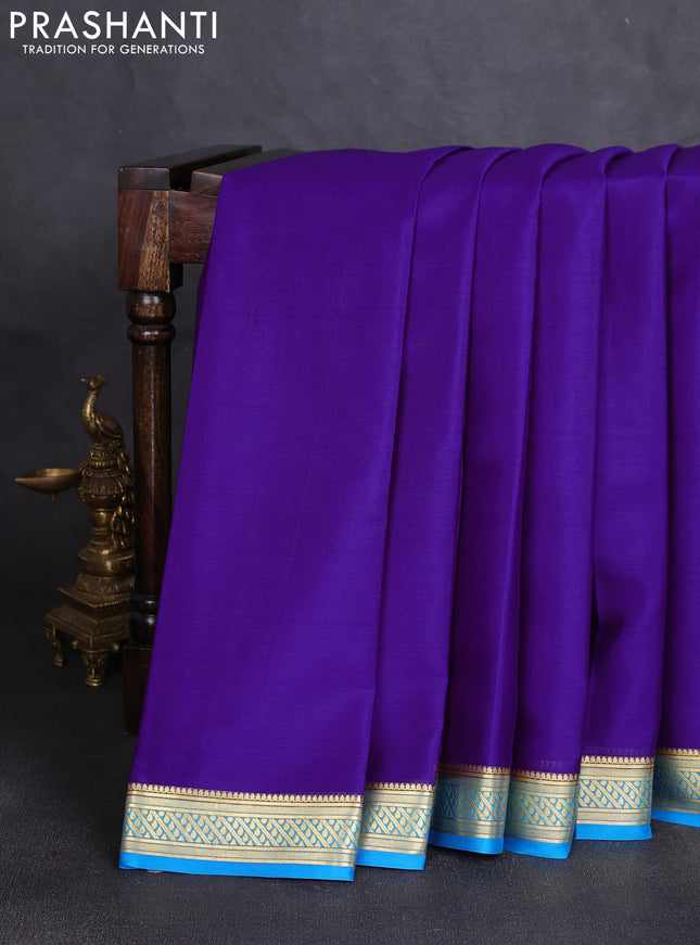 Pure mysore silk saree deep violet and cs blue wih plain body and zari woven border