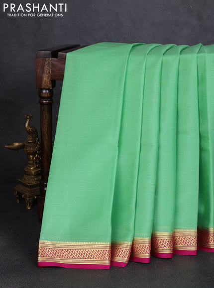 Pure mysore silk saree pista green and pink with plain body and zari woven border
