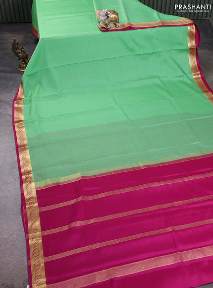Pure mysore silk saree pista green and pink with plain body and zari woven border