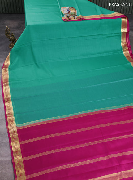 Pure mysore silk saree teal blue and dark pink with plain body and zari woven border