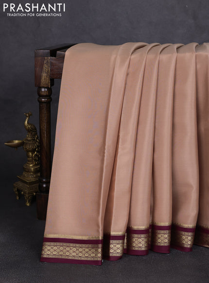 Pure mysore silk saree sandal and wine shade with plain body and zari woven border