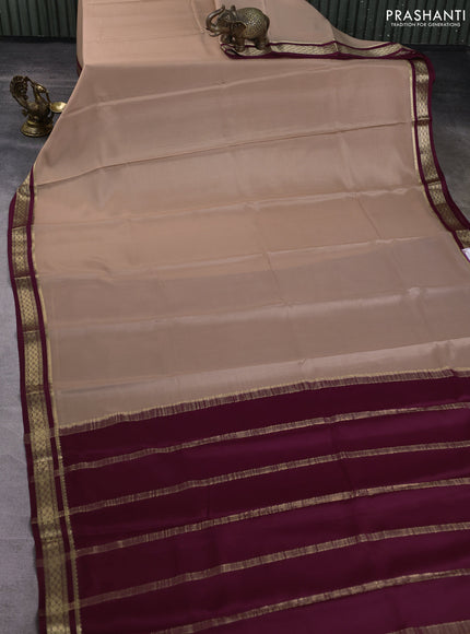 Pure mysore silk saree sandal and wine shade with plain body and zari woven border