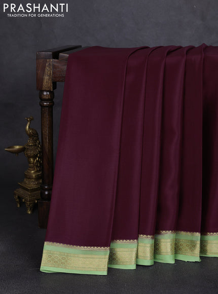 Pure mysore silk saree deep wine shade and pista green with plain body and zari woven border