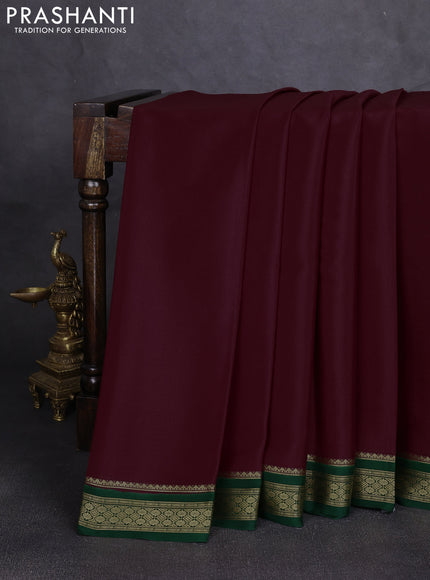 Pure mysore silk saree deep wine shade and bottle green with plain body and zari woven border