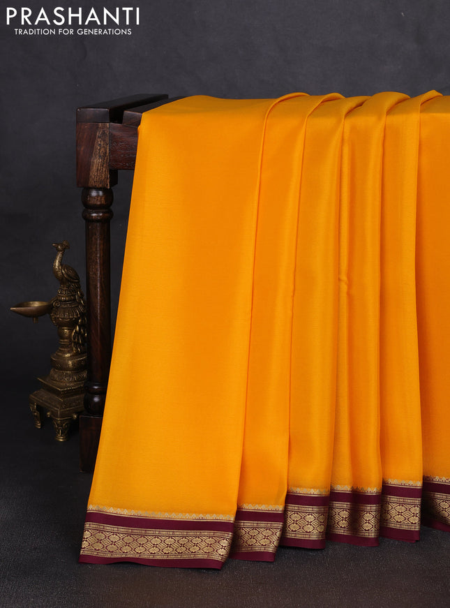 Pure mysore silk saree yellow and deep wine with plain body and zari woven border
