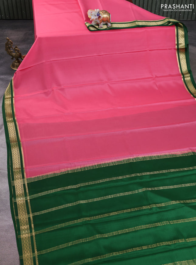 Pure mysore silk saree peach pink and green with plain body and zari woven border